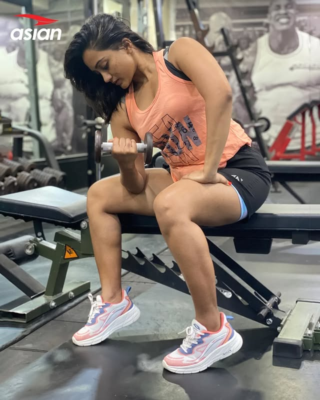 Woman working out wearing Asian Footwears workout shoes