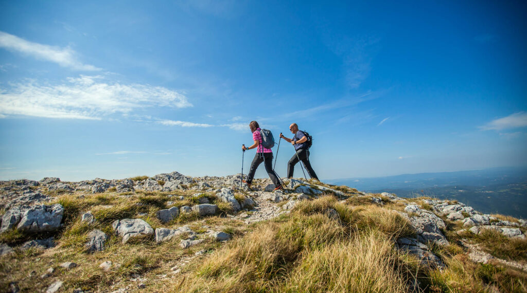 Buy Asian Footwears and trek like this couple.